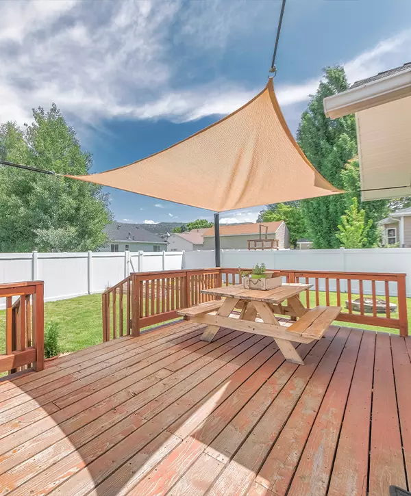 deck repair services in Blue Bell, wooden deck with deck railing with a sunshade